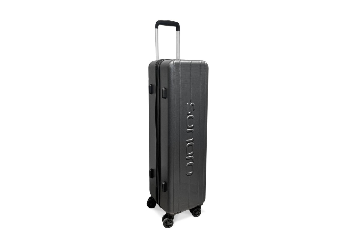Trolley antracite a guscio rigido con maniglia telescopica estratta e quattro ruote