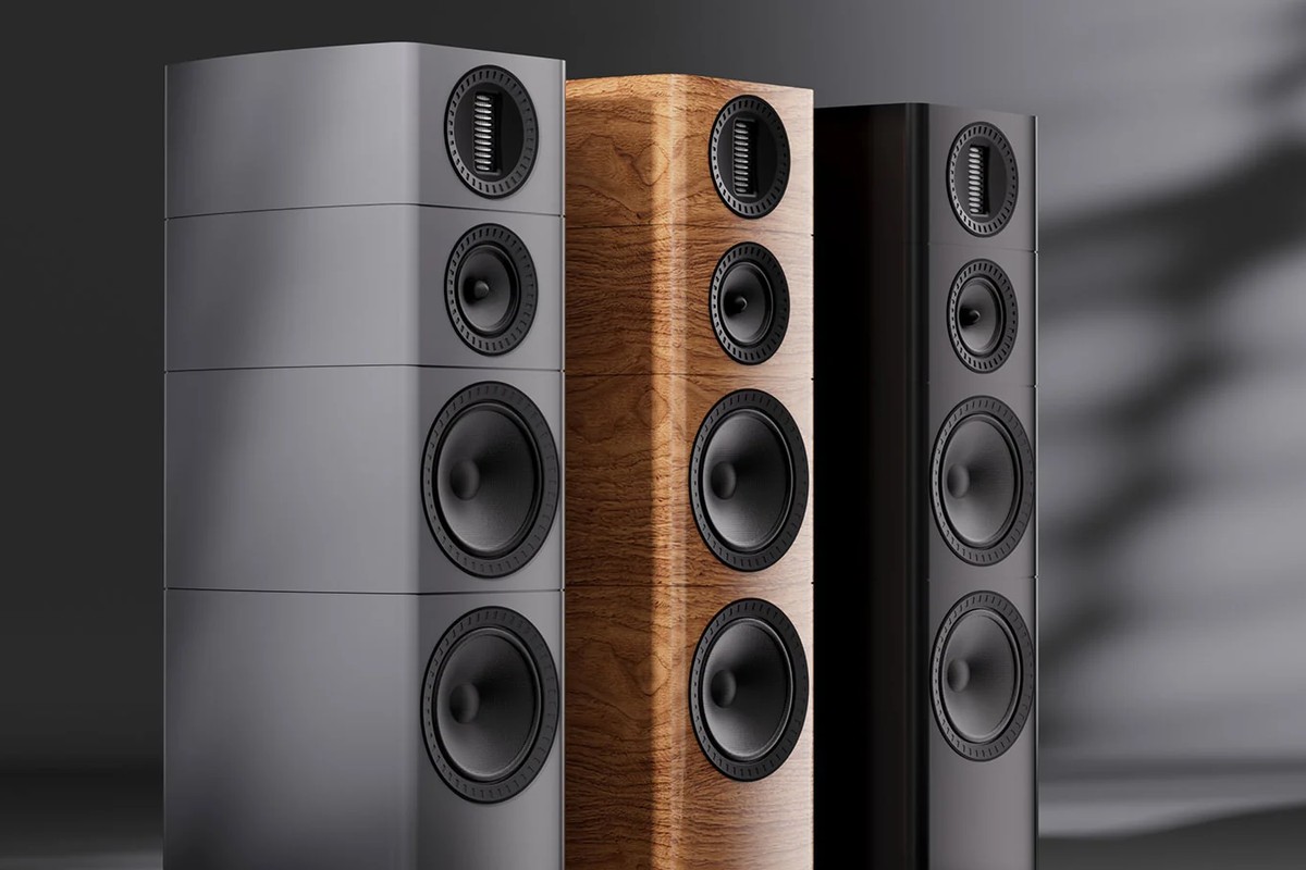 Close-up of three towers in grey, light walnut and black, with their tweeter at the top of the front baffle