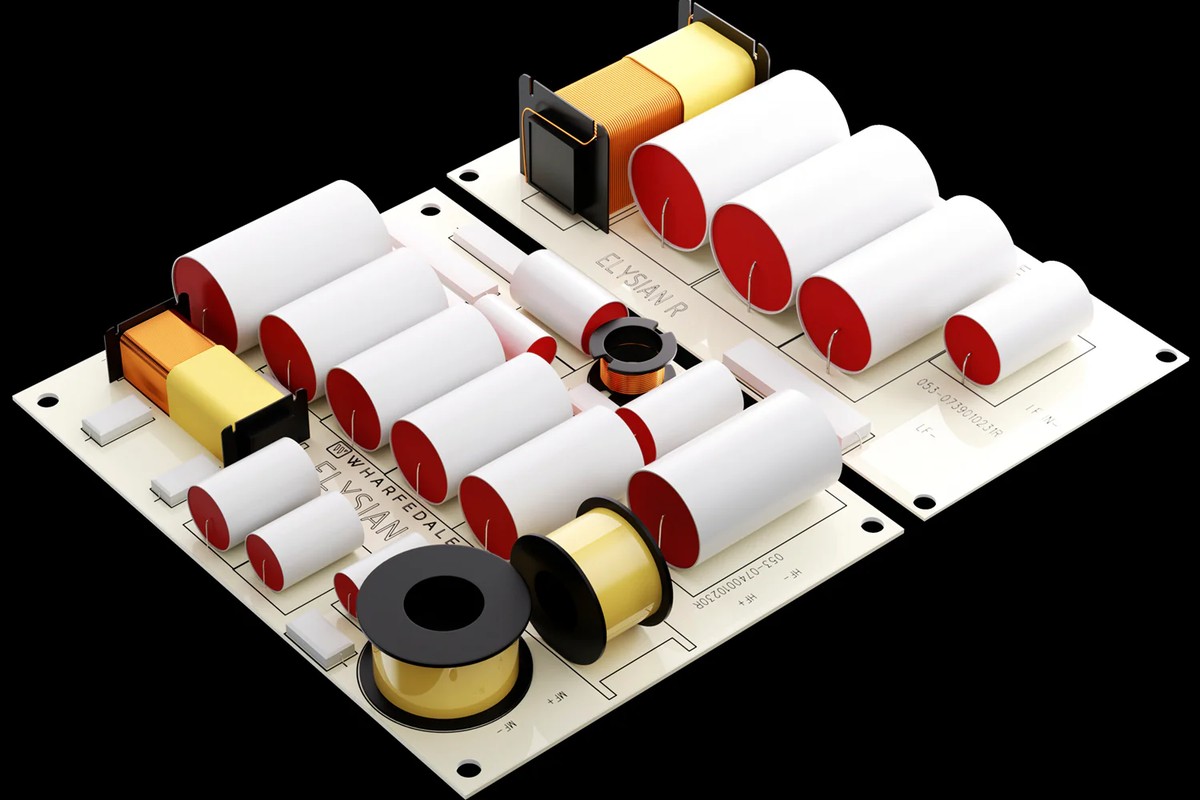 Close-up of the tower's crossover, with coils and capacitors on two light circuit boards