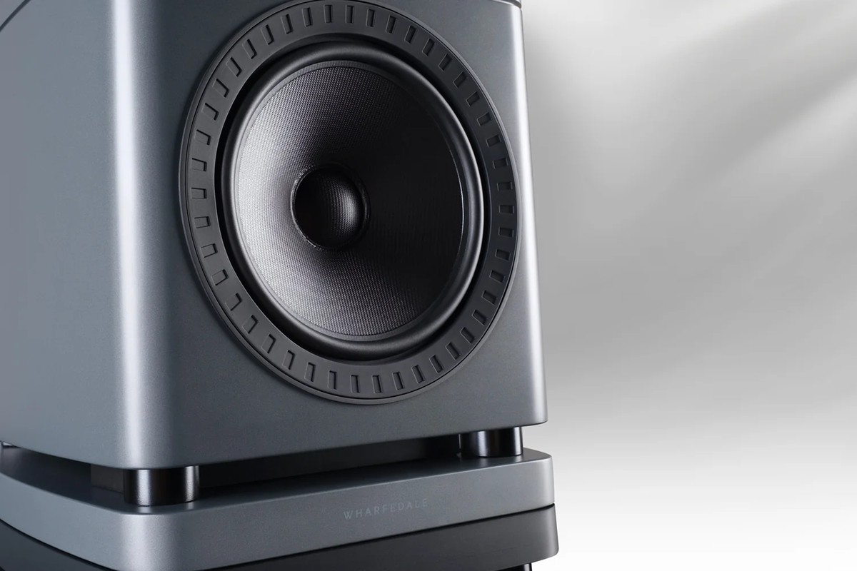 Close-up of the 8.5-inch woofer in a grey finish and its base