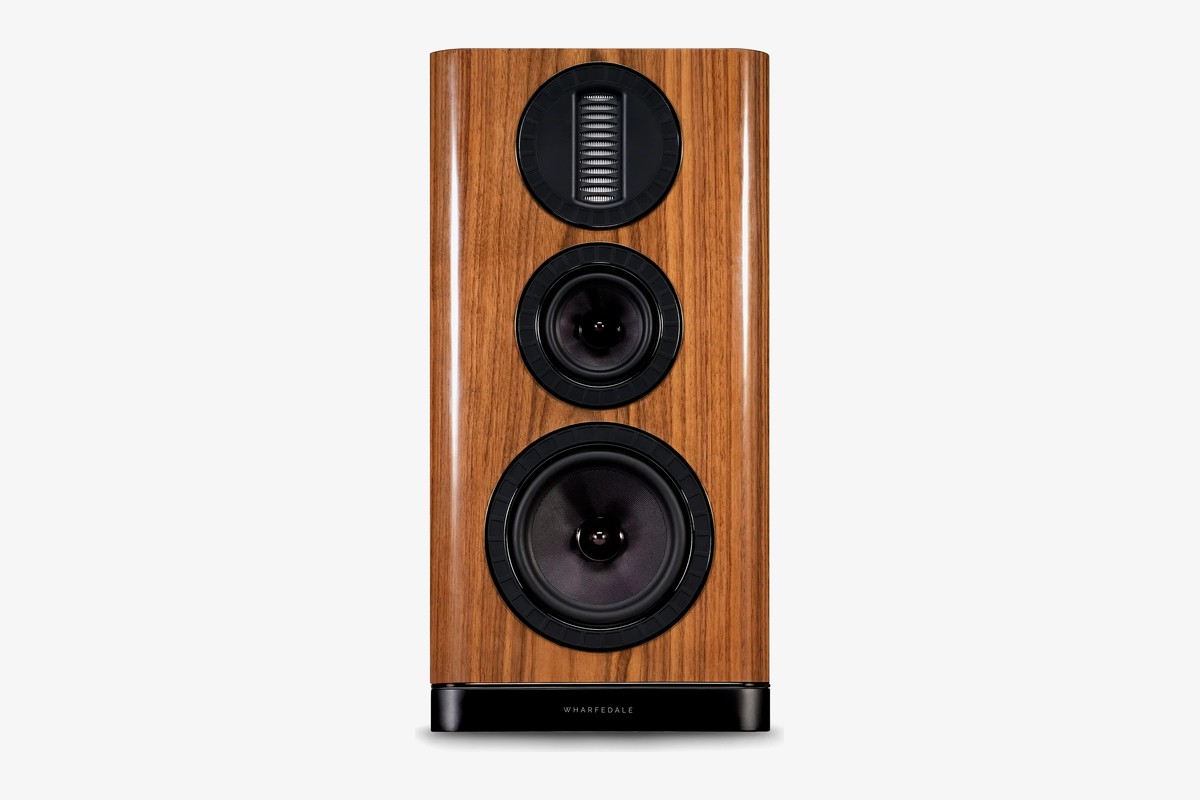 Walnut bookshelf speaker seen from the front, on a white background