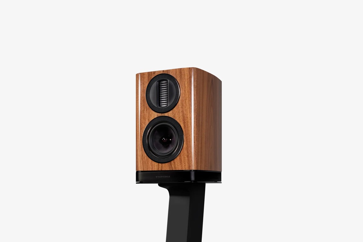 Walnut bookshelf speaker on its stand, front view, with its AMT tweeter and woofer