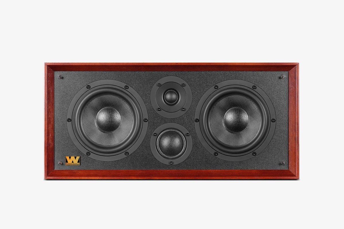 Mahogany front of the centre speaker, with its four drivers and gold logo