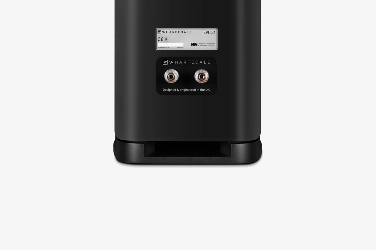 Rear of a black bookshelf speaker with its connection terminals