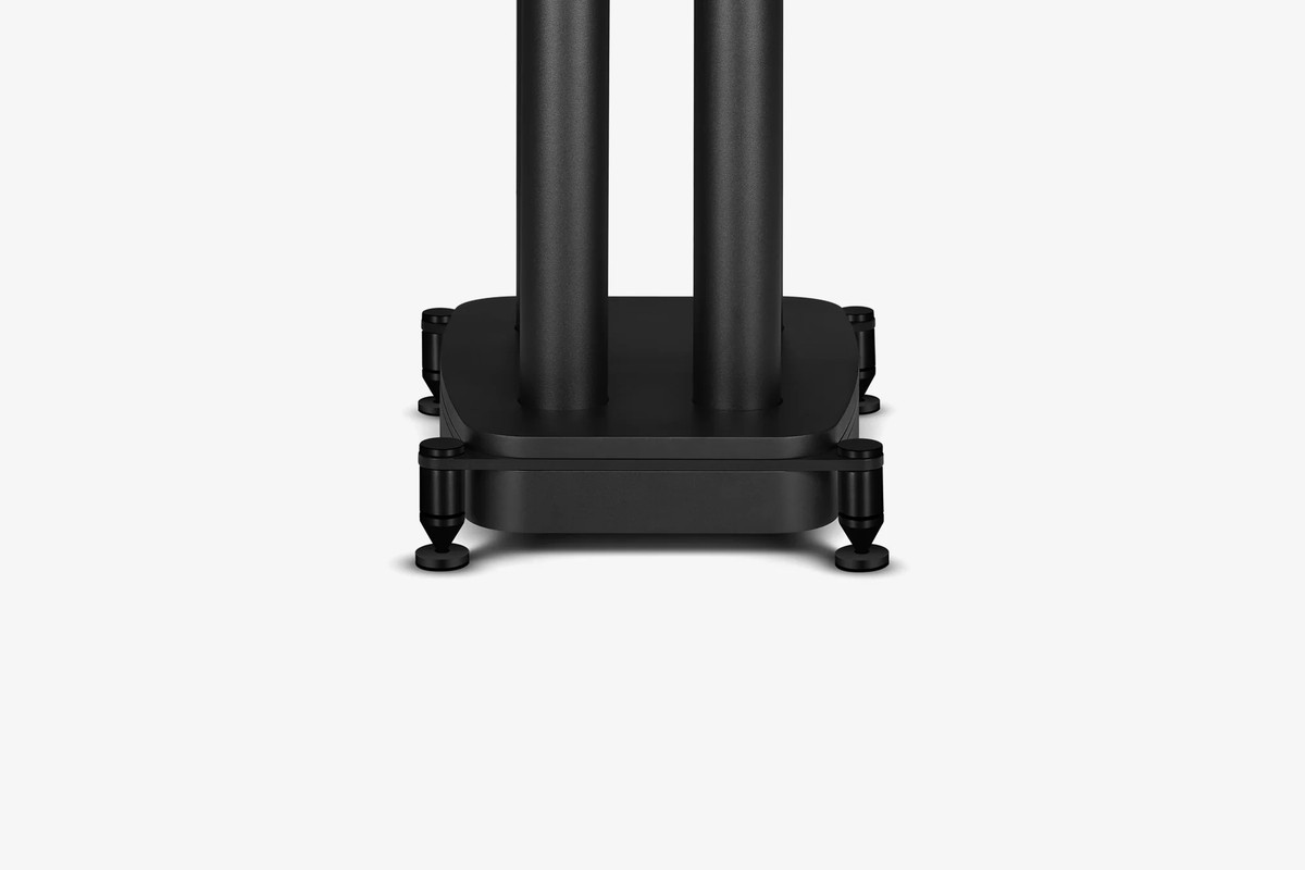 Base and columns of a black speaker stand seen in profile