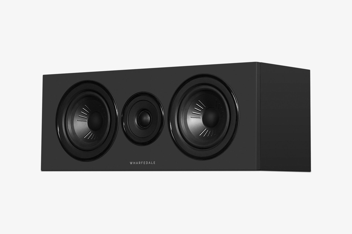 Black centre speaker seen at three-quarter angle, with its tweeter between two bass drivers