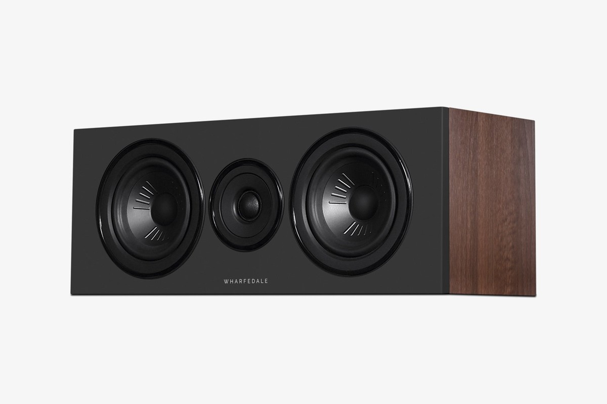 Centre speaker with a walnut side seen at three-quarter angle