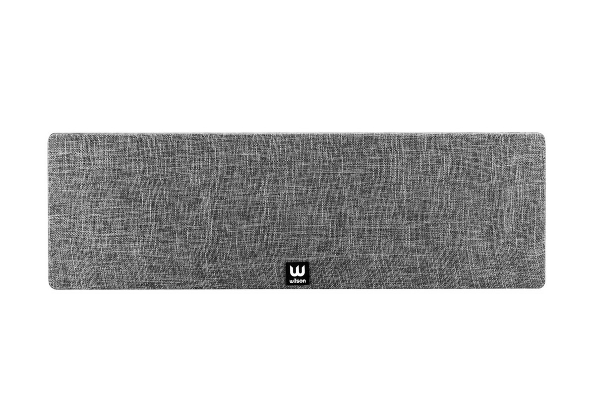 Rectangular grey grille with black badge on a white background