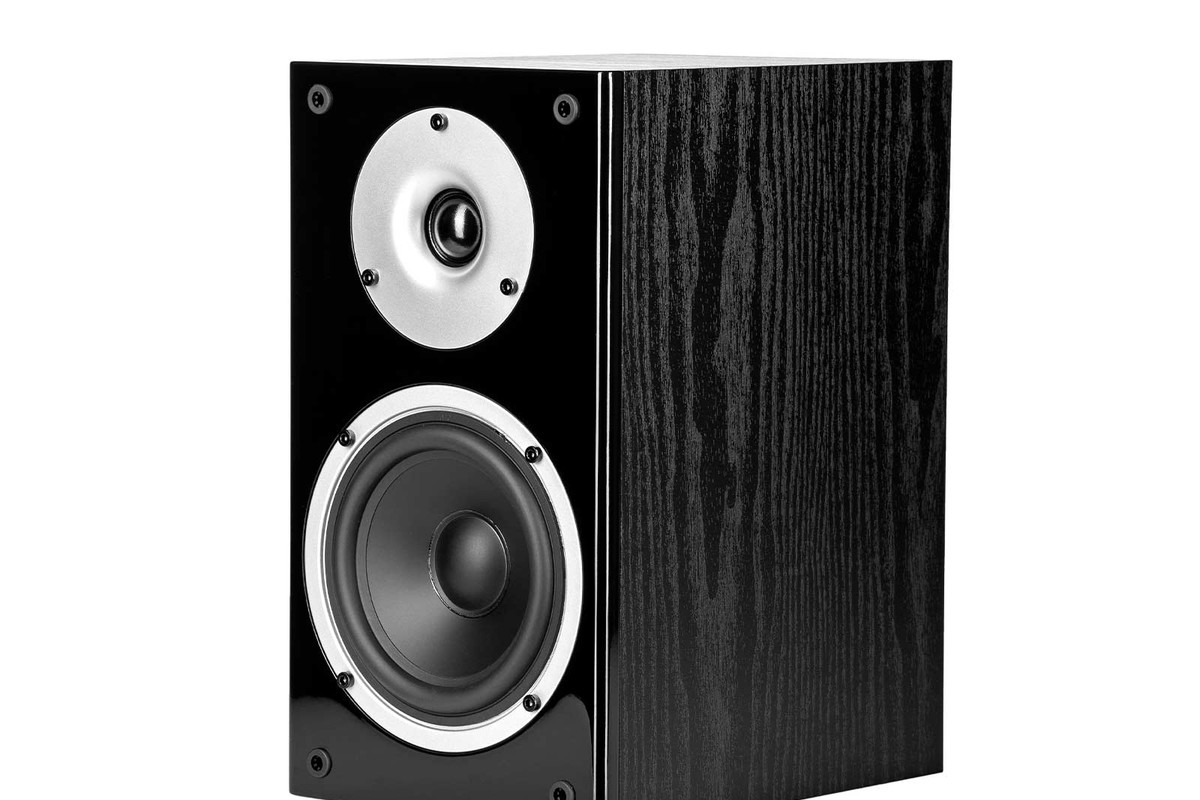 Black bookshelf speaker seen from three quarters, with dome and 5-inch driver