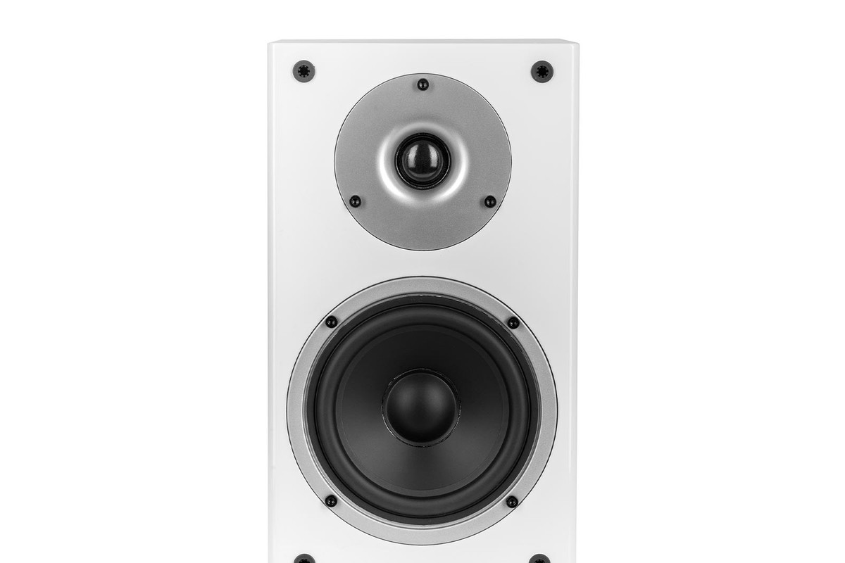 White bookshelf speaker seen from the front, with dome and mid-range driver