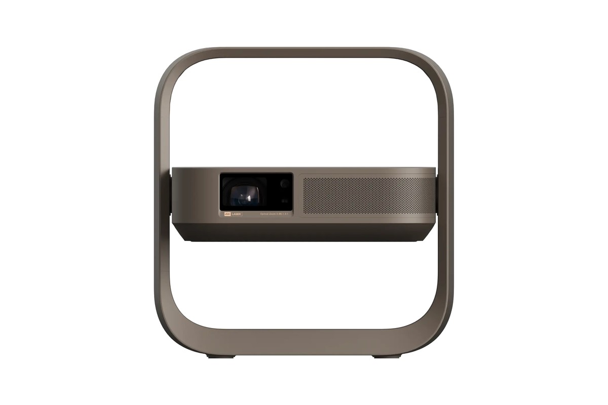 Projecteur compact taupe vu de face dans son cadre-poignée carré