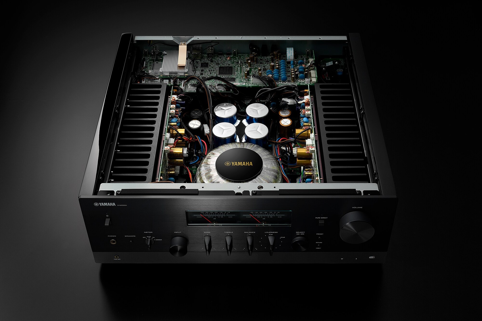 Inside view of the chassis, central power supply and circuits on each side