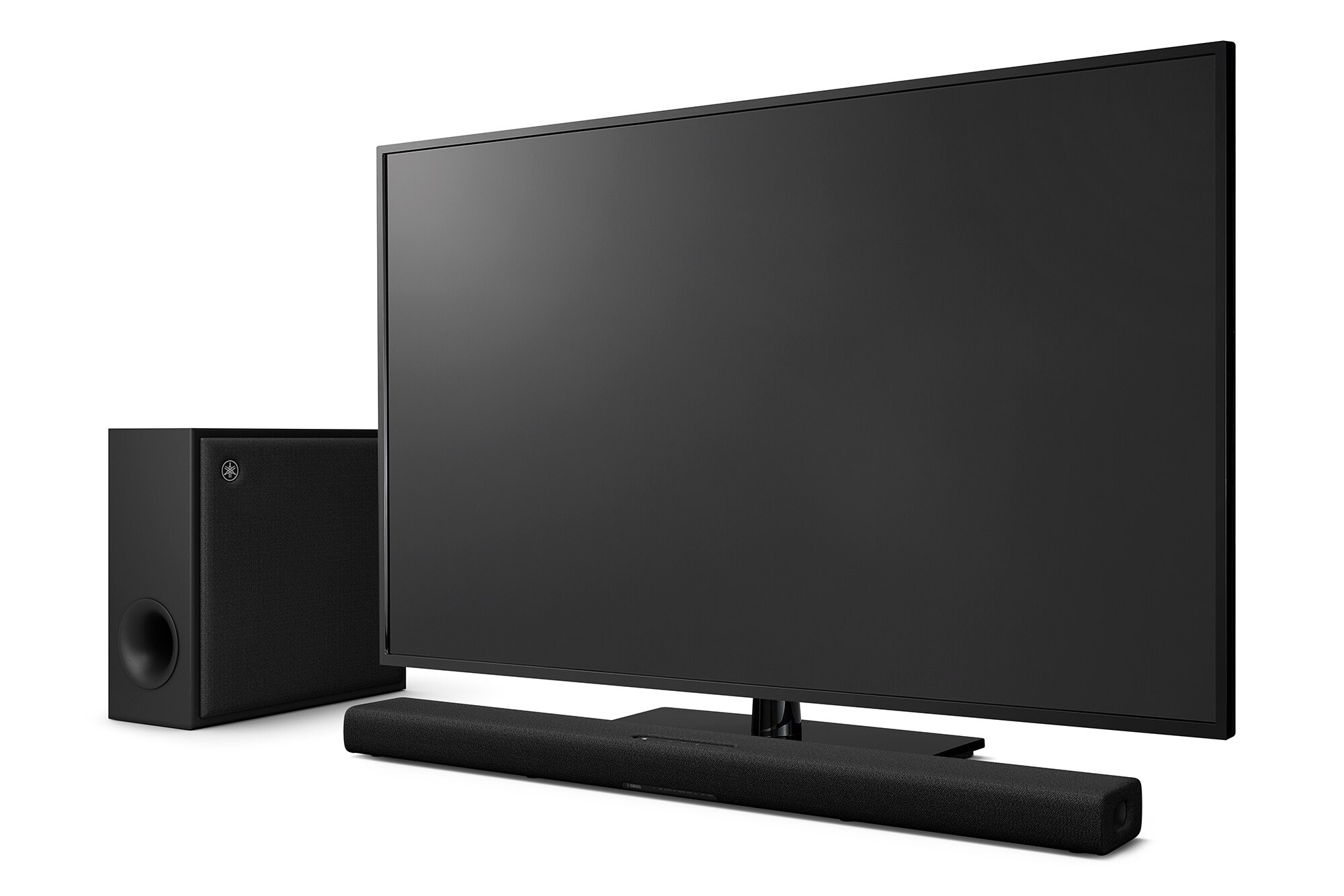 Sound bar and wireless subwoofer set up under a television on its stand