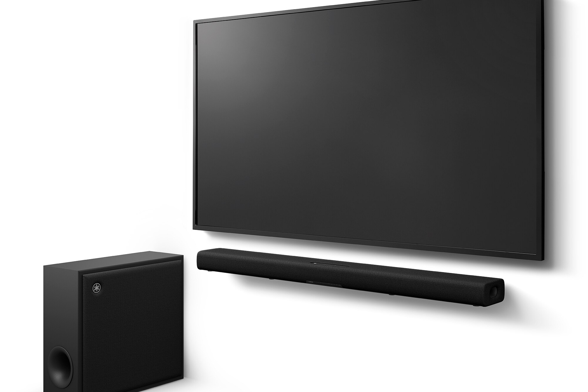 The set installed under a wall-mounted television