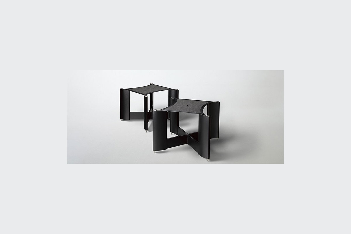 The pair of stands on a grey background, listening height visible
